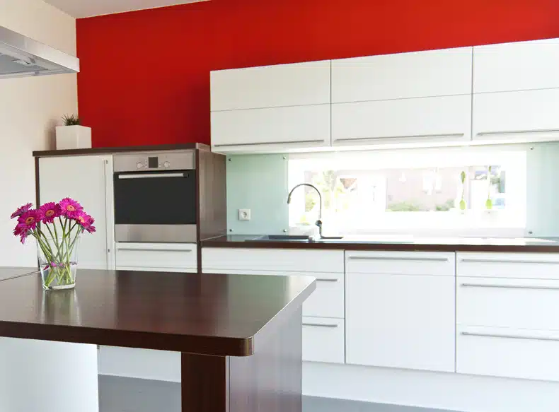red kitchen paint with white cabinets