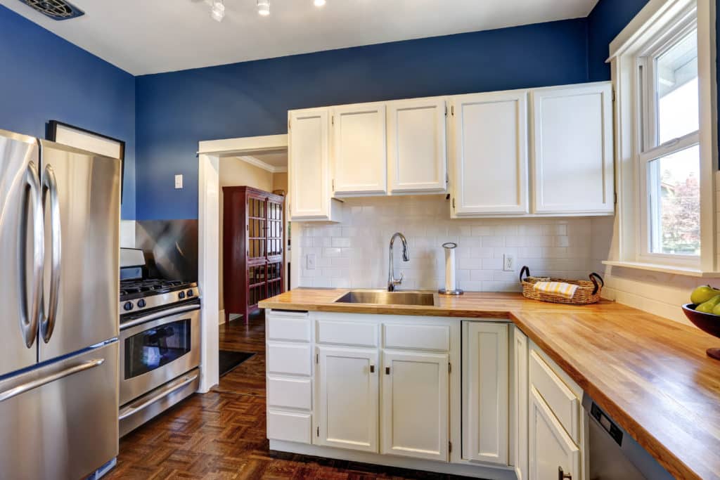 dark blue kitchen color ideas with white cabinets