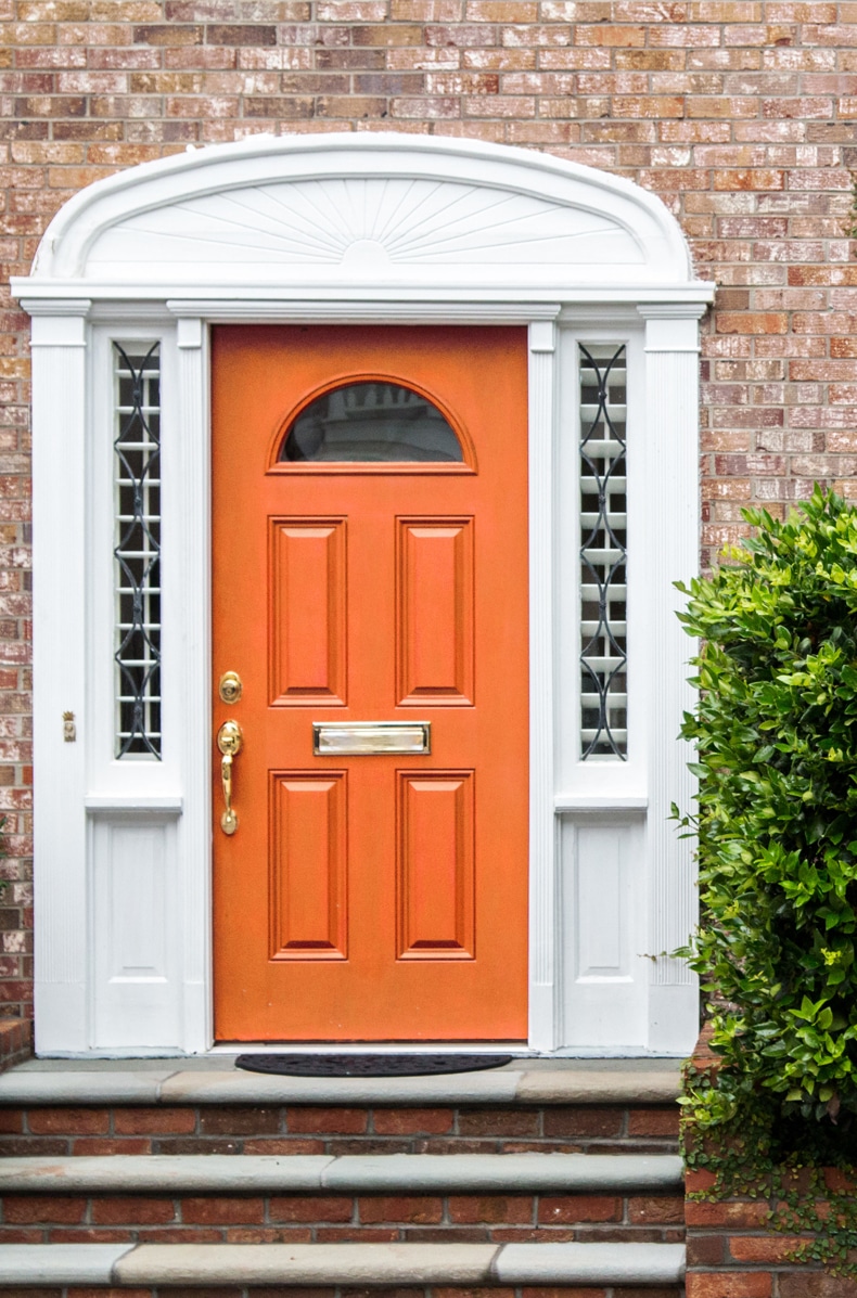 front door orange paint color for brick homes