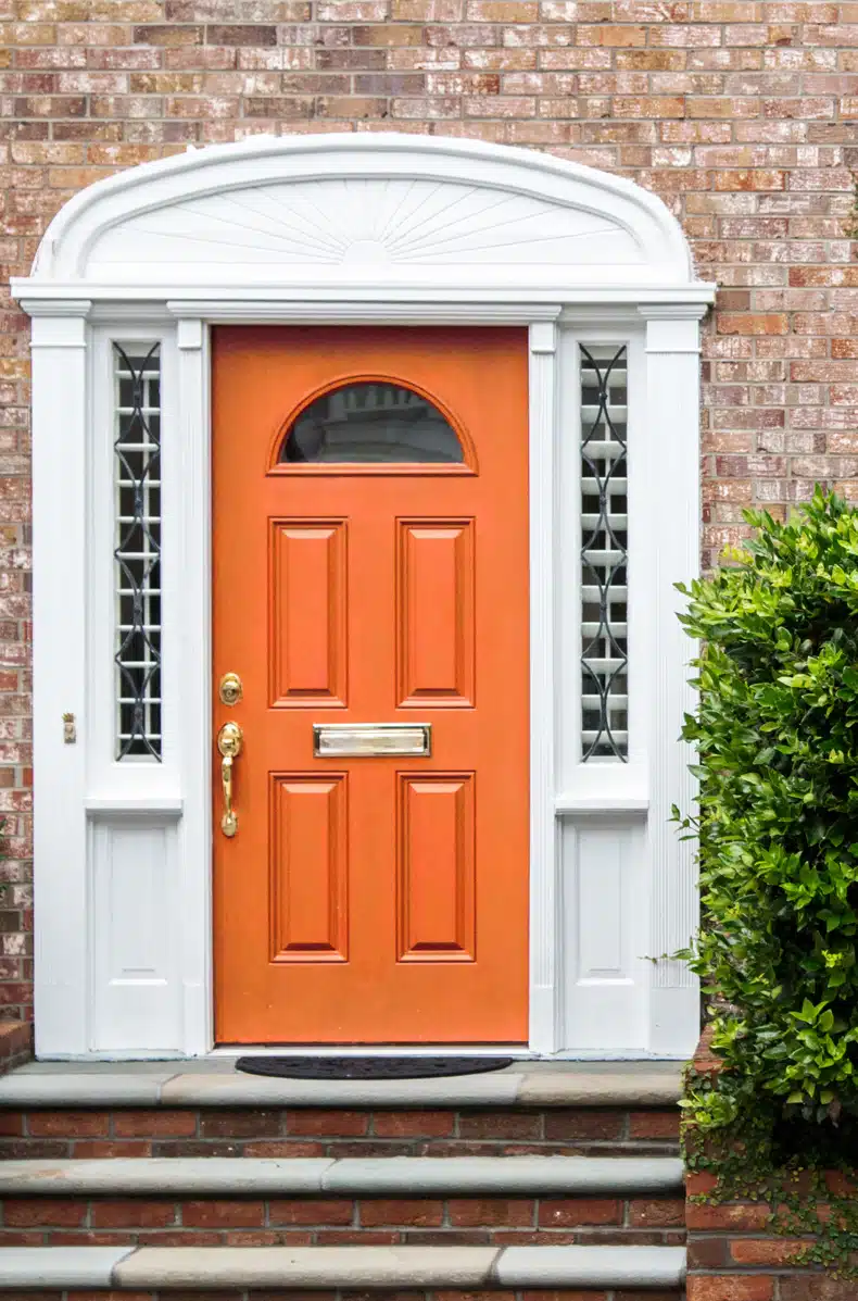 front door orange paint color for brick homes