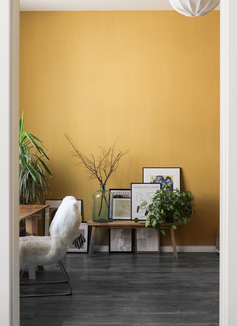 gold wall colors with gray floors