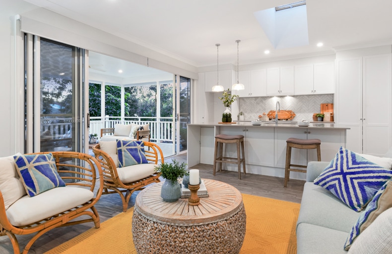 bright orange rug for grey floor