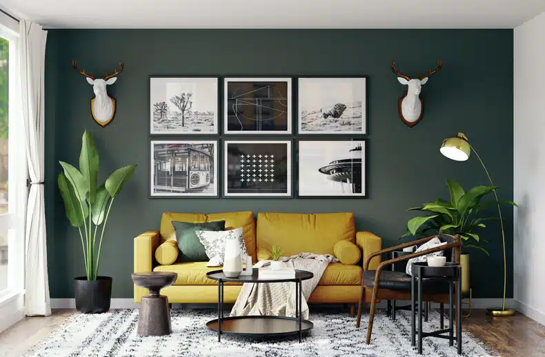 sage green wall with a mustard sofa