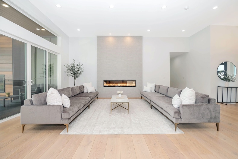 built-in fireplace on a large living room wall