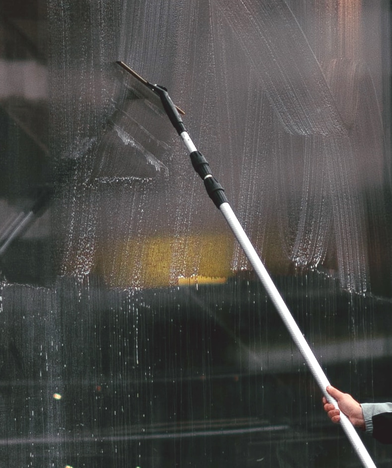 grab a telescopic pole to clean your unreached window