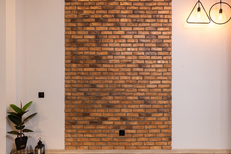farmhouse living room accent wall brick idea