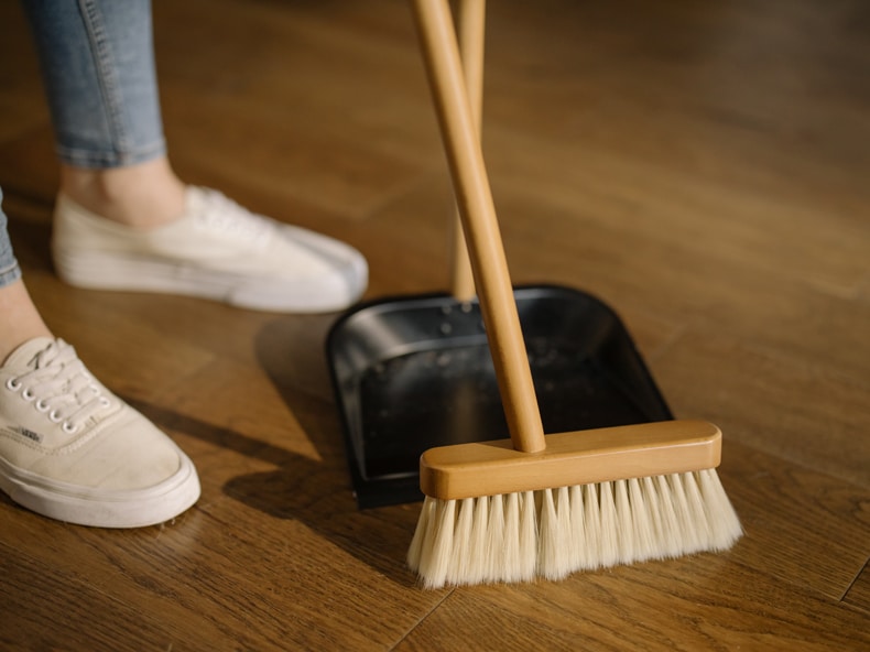 dust mop cleaning a hardwood floor