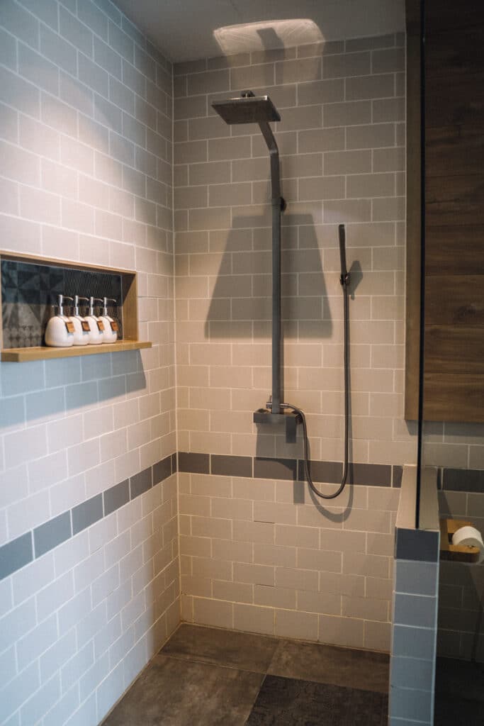 subway tiles' neutral color palette for bathroom shower