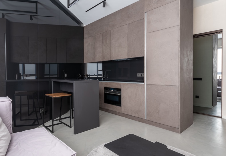 kitchen taupe cabinet with charcoal wall