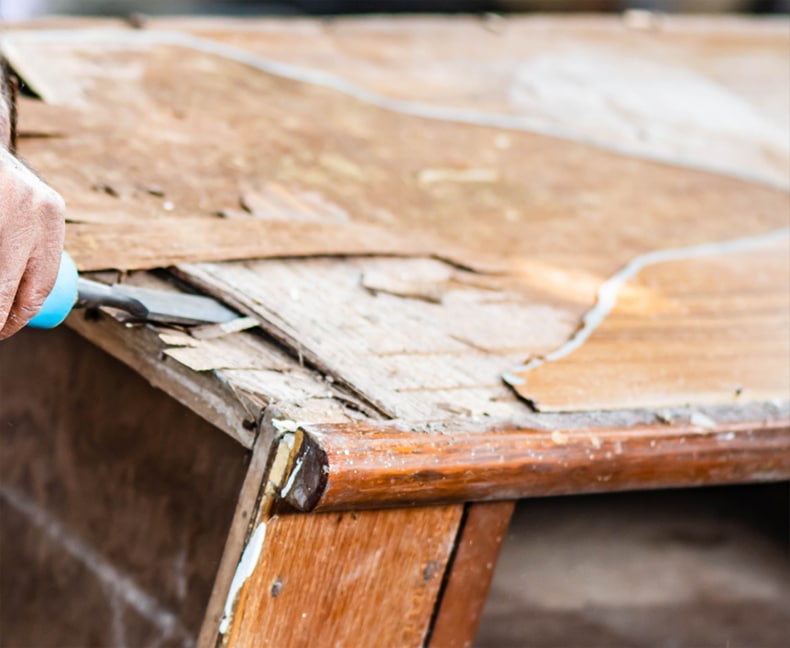 repairing damaged areas of your old kitchen cabinet