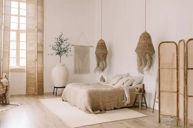 Boho wall art ideas can be as creative and inviting in the bedroom. Create an eclectic touch in your home by hanging dreamy tapestries or macramé pieces on the walls. Add nature-themed paintings like flowers, birds, and other elements to create a vibrant look. 