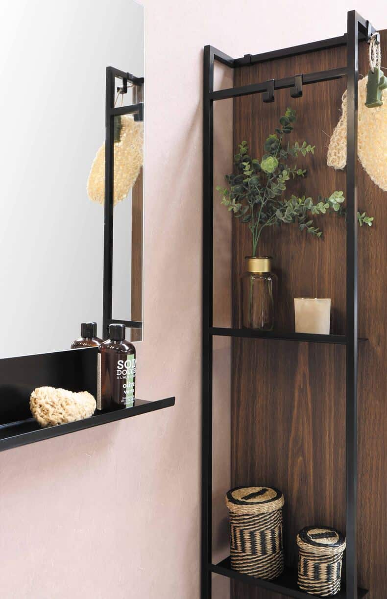 Four tips for organizing a small bathroom: declutter, invest in storage, use space above the door, and group similar items together.