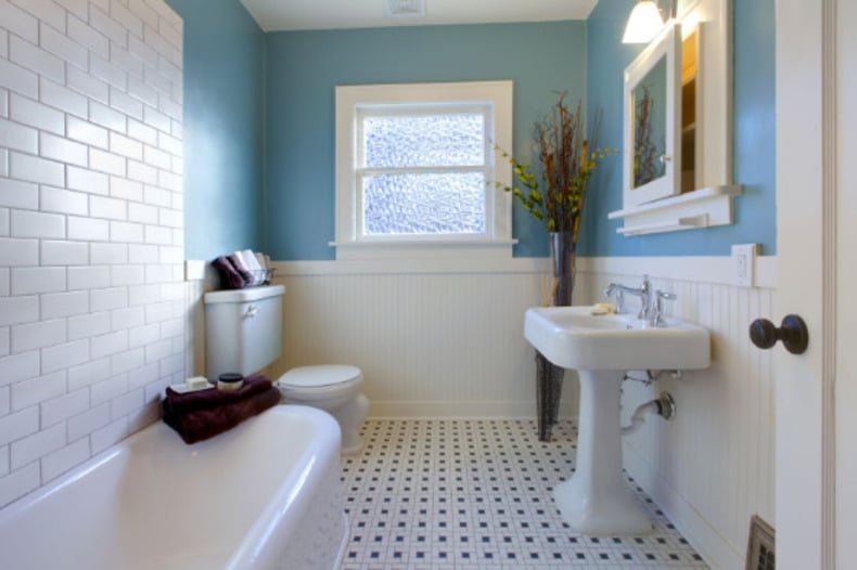 Minimalist bathroom color schemes: light and airy pastels, creamy neutrals, with colorful accents for a cozy touch