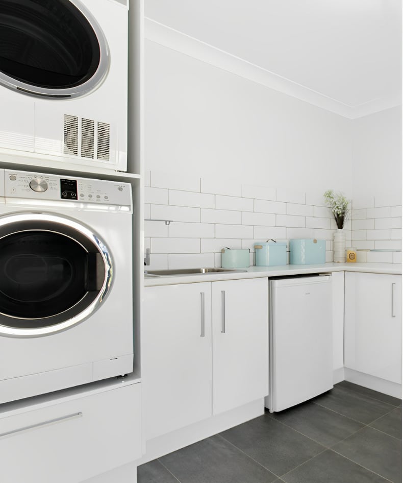 Stackable washer and dryer and sink ideas for a small laundry room to make it efficient and brighter
