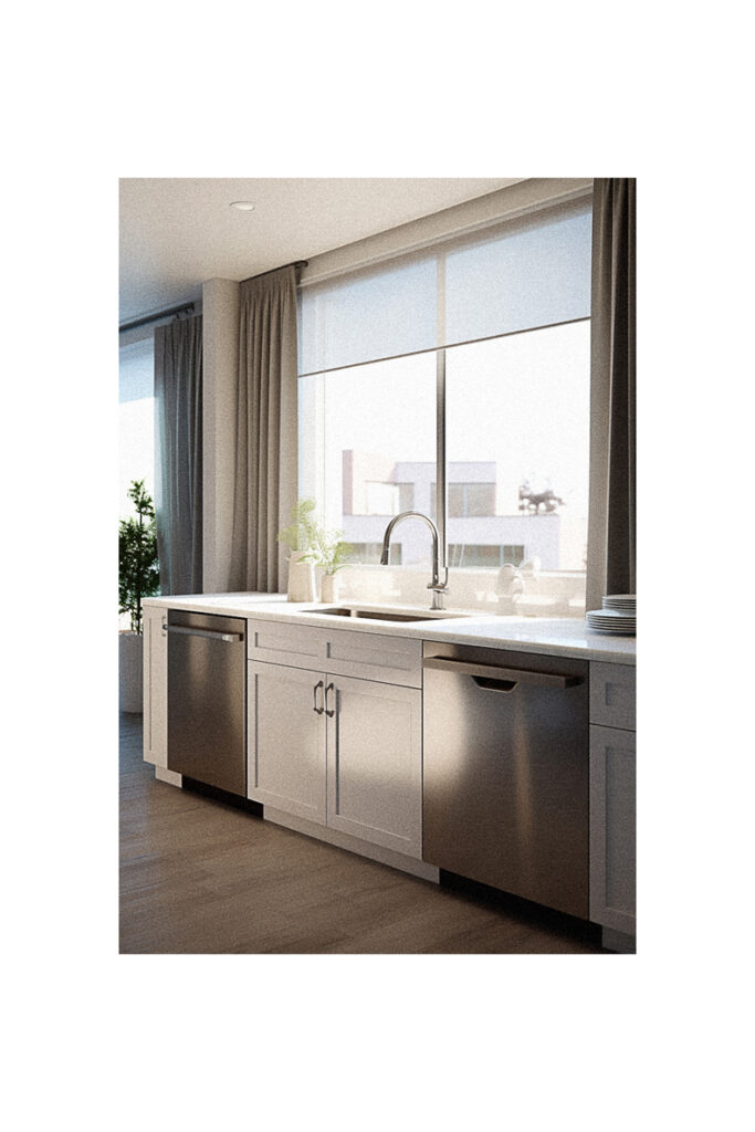 A modern kitchen with stainless steel appliances and a window valance.