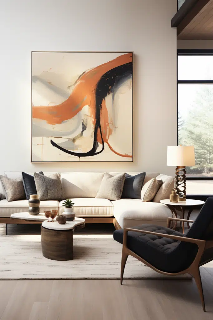 An organic living room with a large modern art painting on the wall.