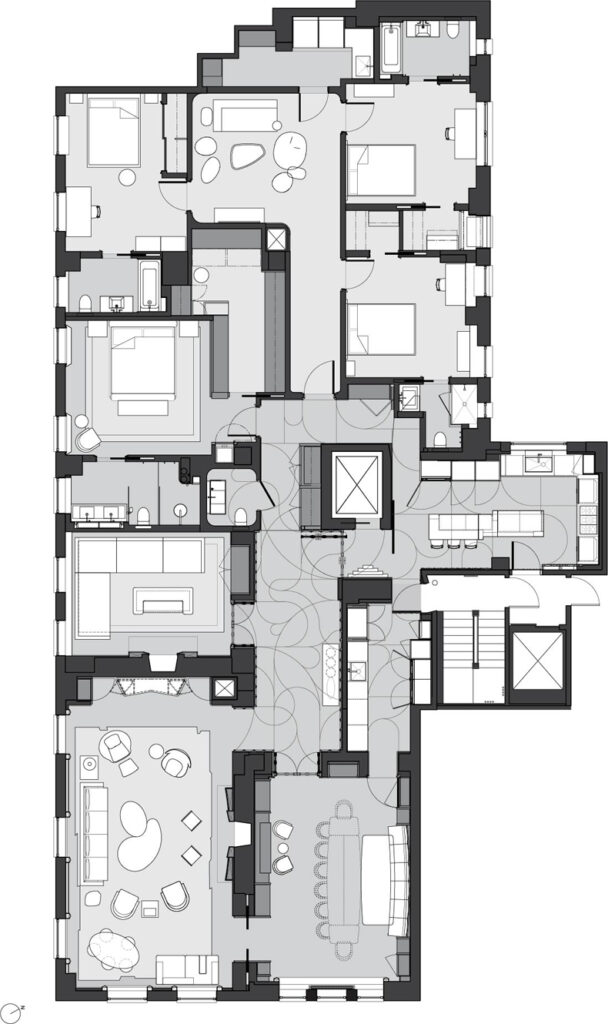 A floor plan of an apartment with two bedrooms and a living room.