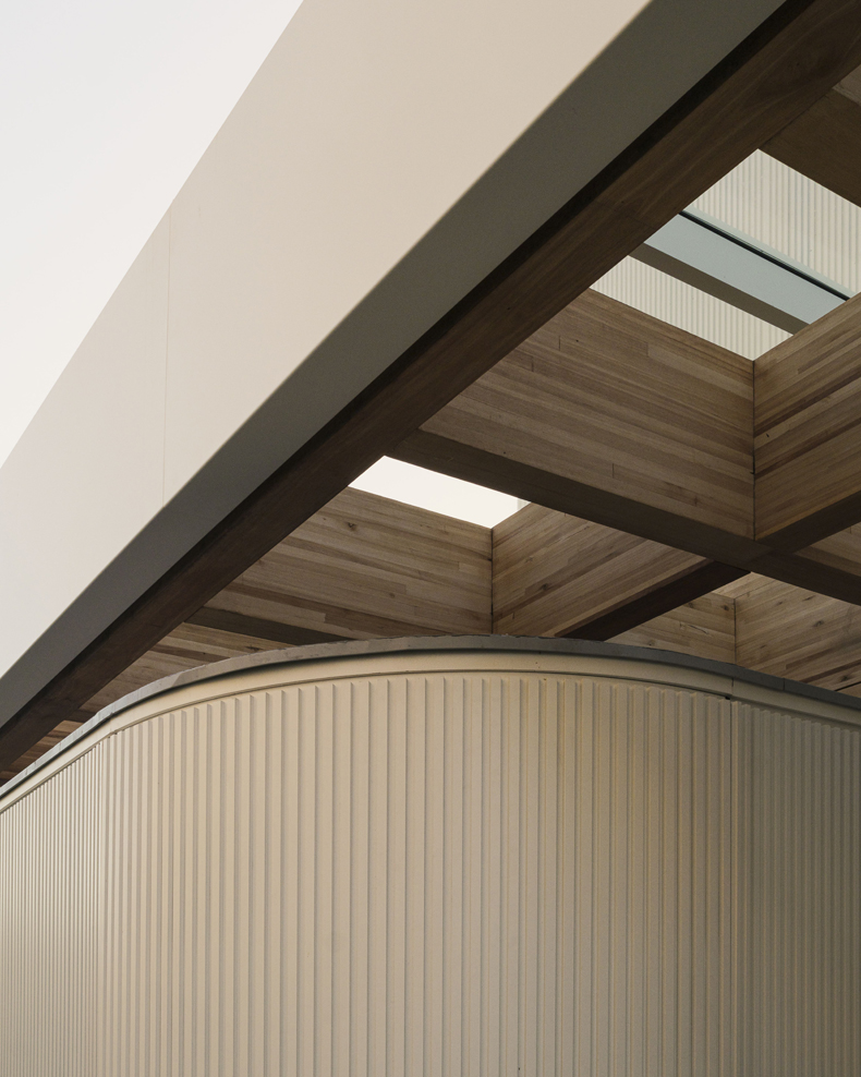 An image of a building with a wooden roof.