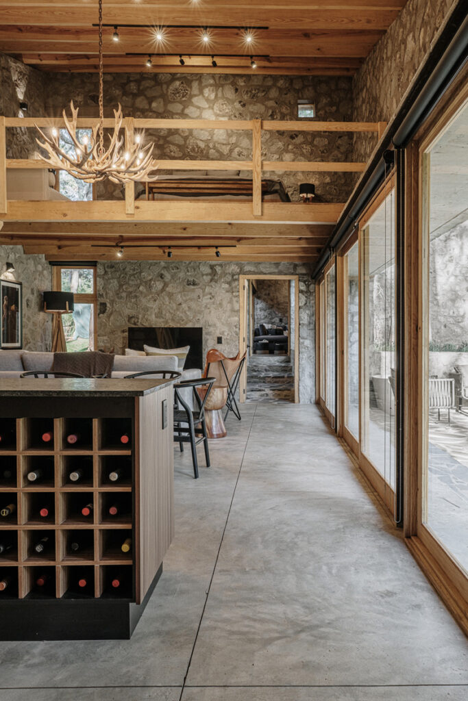 A Petraia House with a wine rack and a fireplace.