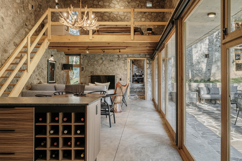 Petraia House, a stone house with a wine cellar and stairs.