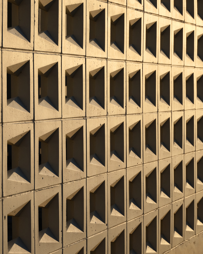 A 3d model of a concrete wall with squares on it.