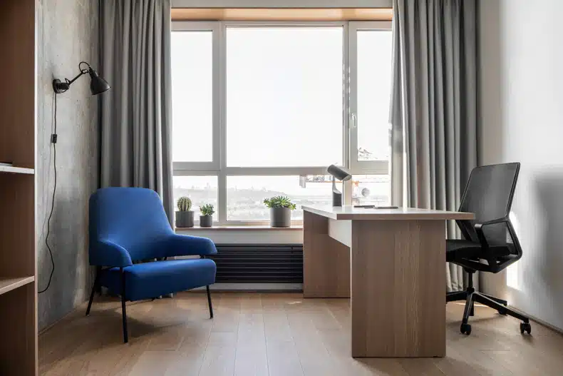 Zaricnyy Apartment, featuring a desk and chair, allows guests to enjoy a view from the window.