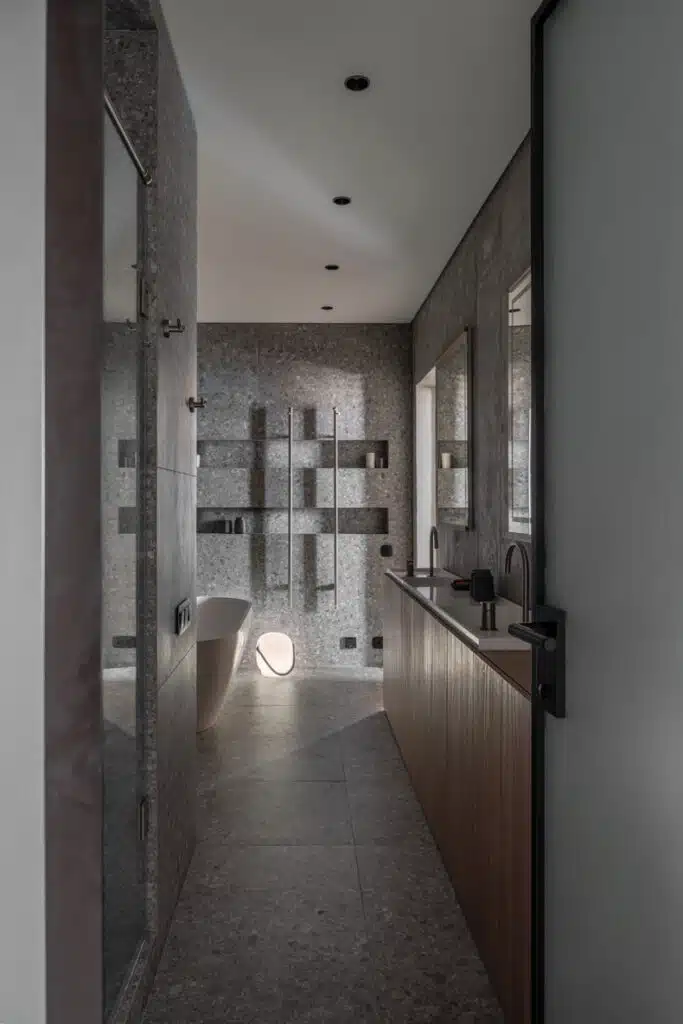 Zaricnyy Apartment features a modern bathroom with a glass shower.