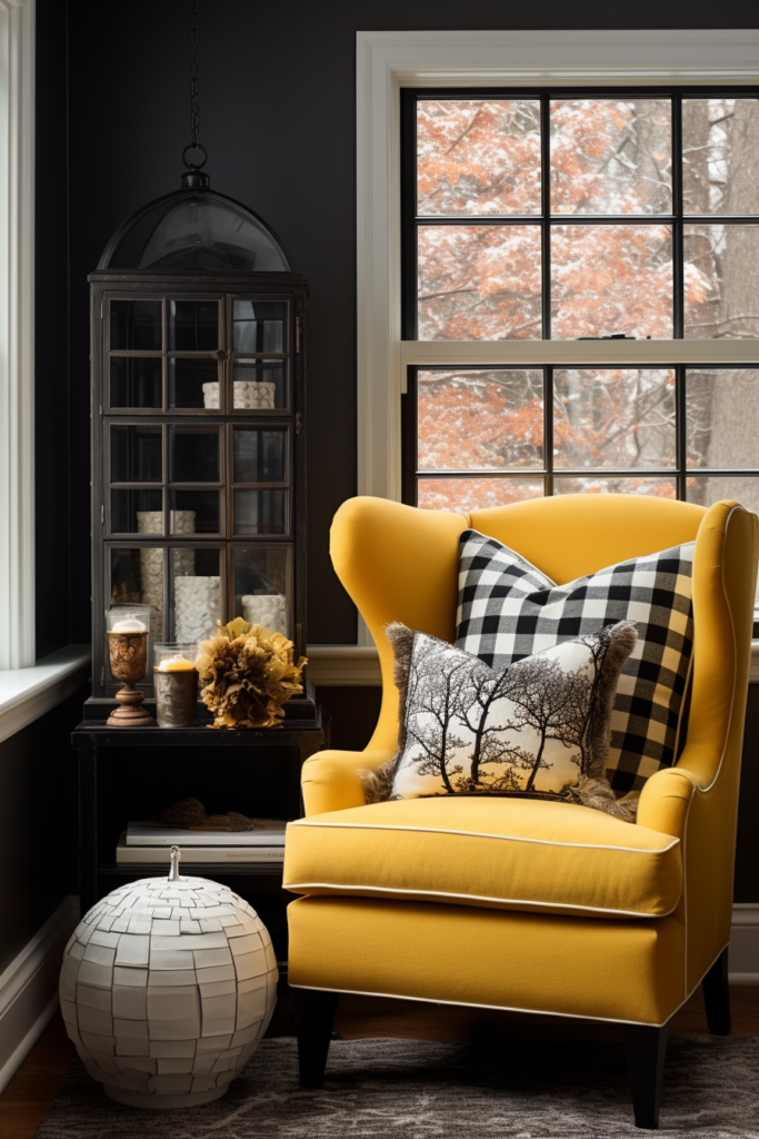 An artful arrangement of a yellow chair in front of a black window.