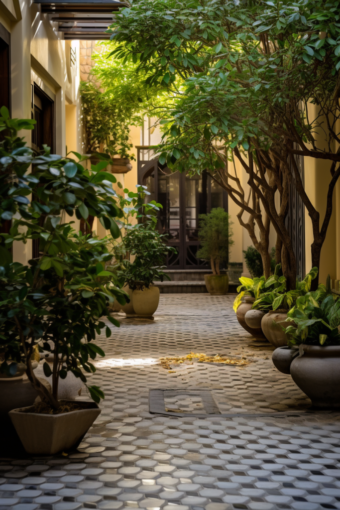 An aesthetically pleasing courtyard adorned with potted plants, embracing current interior design trends of 2024.