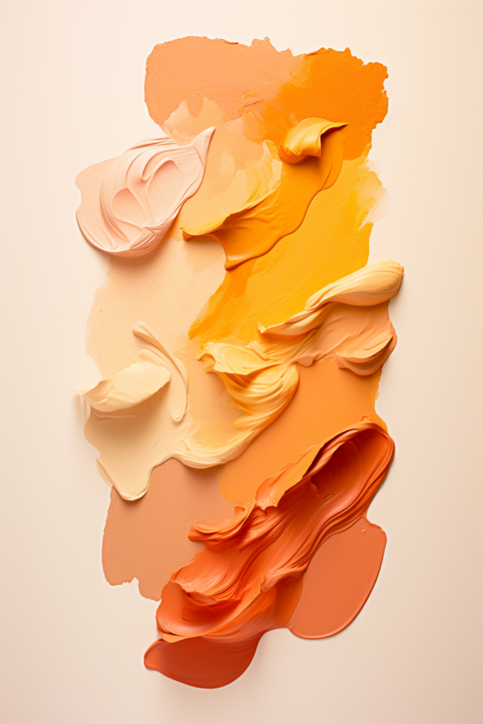 A set of stunning orange and yellow paints on a beige background, creating visual harmony.
