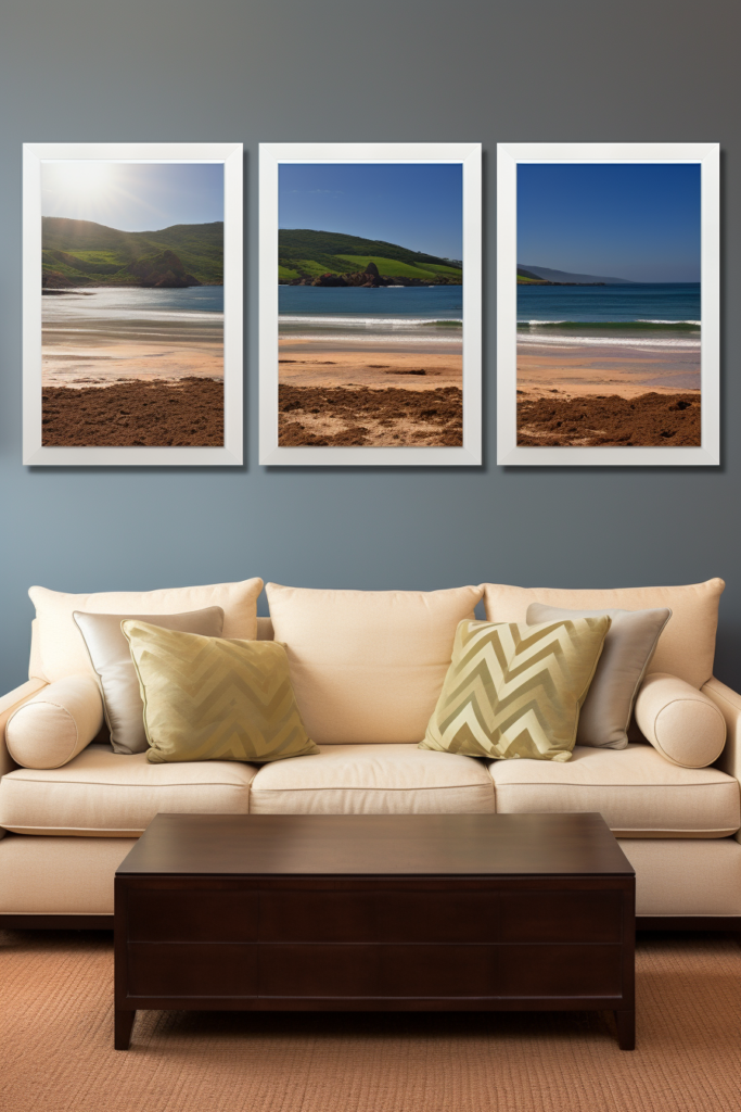 Elevate your living room with stunning large wall art ideas, featuring a stylish couch and three framed pictures.