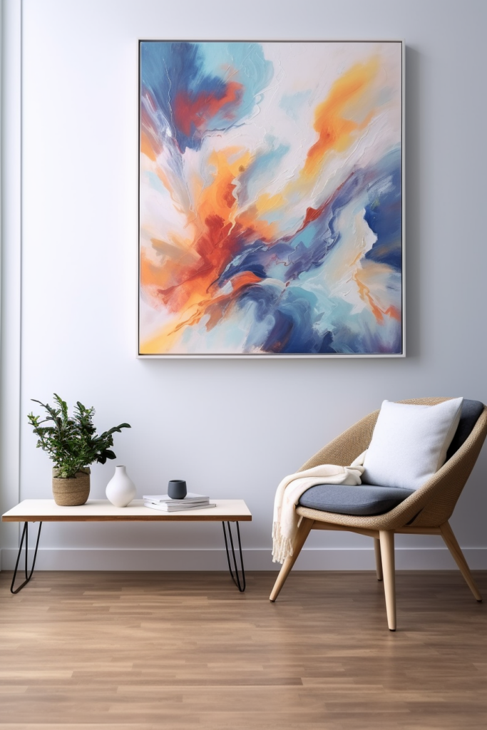 A large abstract painting adorns the wall above a chair in a modern living room.