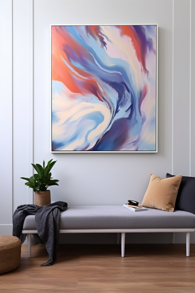 A large abstract painting hangs above a couch in a modern living room.