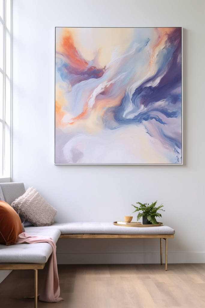 An abstract painting hangs above a couch in a modern living room.
