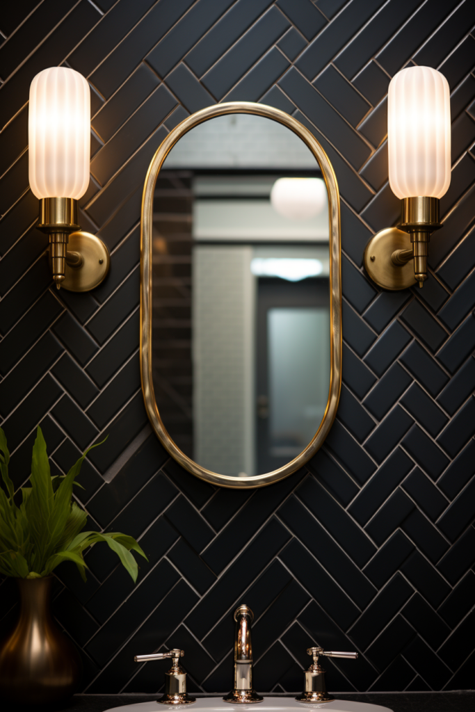 A bathroom with a timeless charm featuring a black tiled wall and a gold mirror.